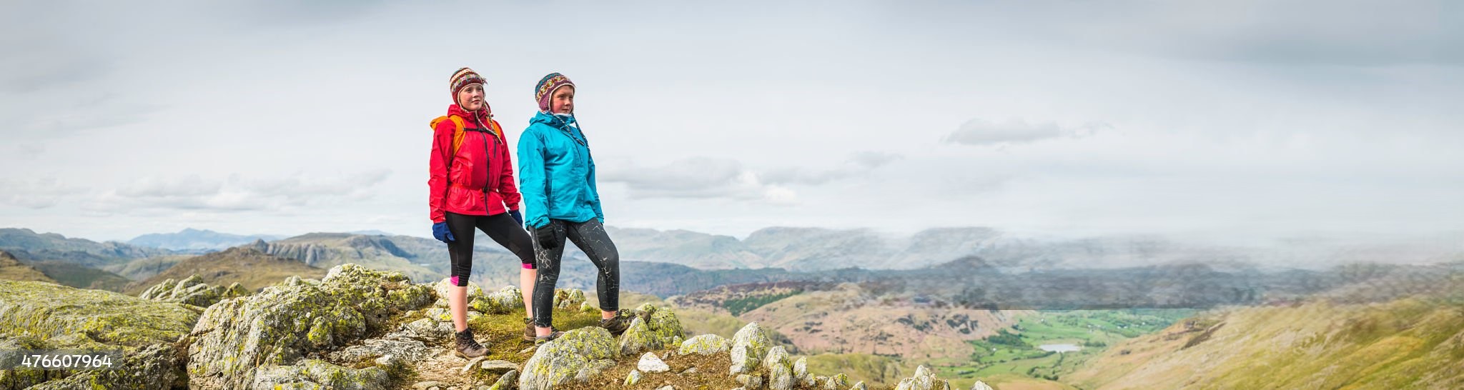  Mature happy woman with backpack.Hiking adventure on sunny autumn day.